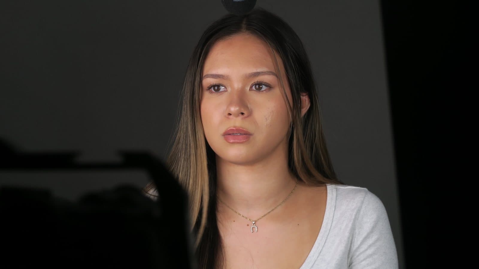 An actor mid-scene on the studio floor