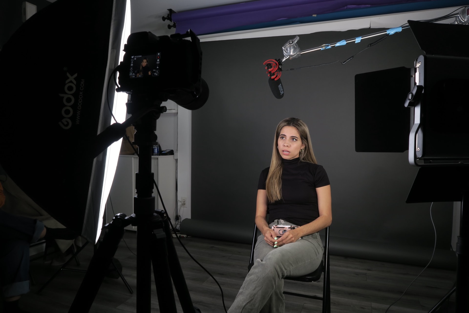 An actor mid-take on the purple backdrop during a self tape at Shiki Studios