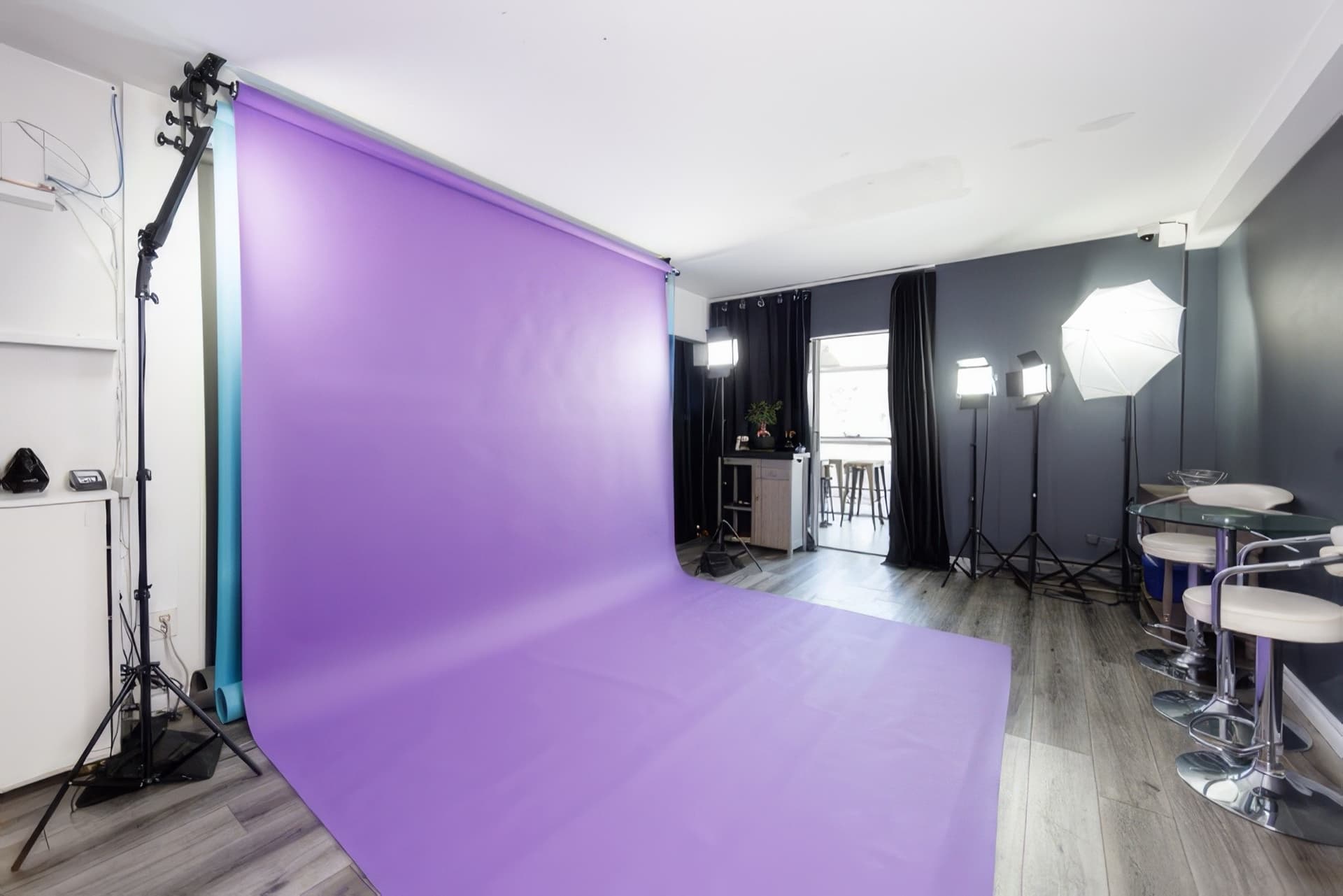 The Shiki Studios space on Queen Street West, set with a purple paper backdrop and lighting